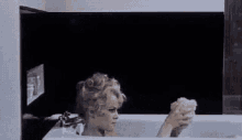 Brigitte Bardot Throwing Sponge GIF - Sponge Throwing To The Face GIFs