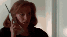 Mulder Its Me Dana Scully GIF - Mulder Its Me Dana Scully Fox Mulder GIFs