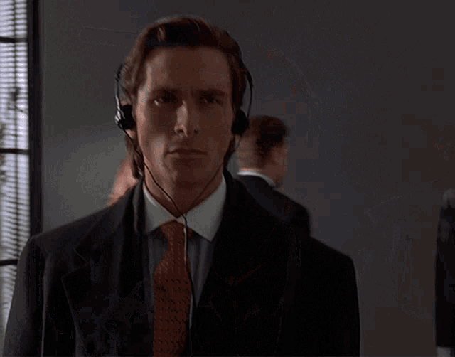 Christian Bale American Psycho GIF - Christian Bale American Psycho Walk GIFs