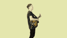 happy george ezra budapest playing the guitar musician
