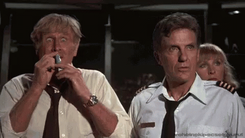 Airplane Movie GIF - Scared Fainted Shocked - Discover &amp; Share GIFs