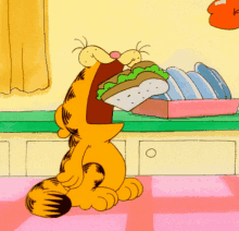 Eating Garfield GIF - Eating Garfield Food GIFs
