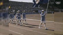 tokyo men men in blue marching olympics tokyo men men in blue marching olympics