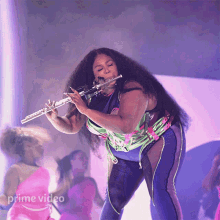 Playing Jazz Flute Lizzo GIF - Playing Jazz Flute Lizzo Lizzos Watch Out For The Big Grrrls GIFs