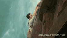 Climb Up Nathan Drake GIF - Climb Up Nathan Drake Tom Holland GIFs