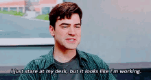 I Just Stare At My Desk, But It Looks Like I'M Working GIF - Office Space Peter Gibbons Ron Livingston GIFs