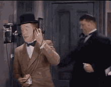 Laurel And Hardy Phone Call GIF - Laurel And Hardy Phone Call Milk Can GIFs