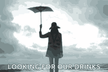 looking for our drinks spinning umbrella ocean sky