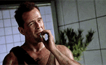 Bruce Willis Smoking GIF - Bruce Willis Smoking Cool GIFs