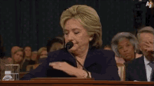 Hillary GIF - Hillary Clinton Brush Off Shoulder GIFs