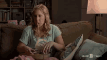 Eating Tv GIF - Eating Tv Amy Schumer GIFs