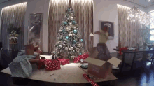 Beyonce Opening Her Christmas Presents GIF - Christmas Beyonce Queen B GIFs