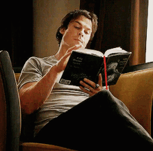 Damon Salvatore Reading Book GIF - Damon Salvatore Reading Book Tvd GIFs