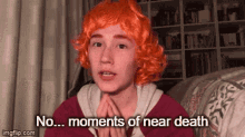 moments of near death explanining orange hair wig