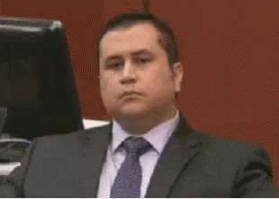 george-zimmerman-trying-not-to-laugh.gif