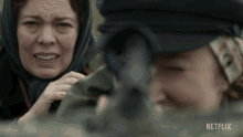 pointing gun princess anne queen elizabeth ii olivia colman the crown pointing gun princess anne queen elizabeth ii olivia colman the crown