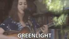 greenlight acoustic singing guitar blurry