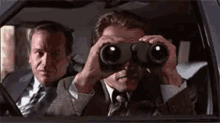 Binoculars GIF - Arnold Schwarzenegger Searching Binoculars GIFs