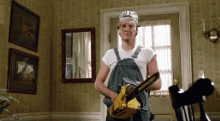 Chainsaw Ready GIF - Michael Keaton Mr Mom Chainsaw GIFs