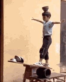 Balancing Act Acrobat GIF - Balancing Act Acrobat Trick GIFs