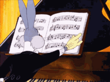 Bugs Bunny Music Sheet GIF - Bugs Bunny Music Sheet Flip Pages GIFs