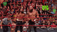 Seth Rollins Braun Strowman GIF - Seth Rollins Braun Strowman Raw Tag Team Champions GIFs
