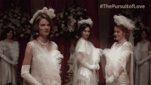 Looking At Each Other Linda Radlett GIF - Looking At Each Other Linda Radlett Lily James GIFs