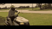 Galactic Cowboys Lawn Mower GIF - Galactic Cowboys Lawn Mower Mowing Grass GIFs