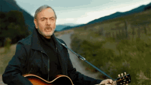 strumming neill diamond something blue feeling it performing strumming neill diamond something blue feeling it performing