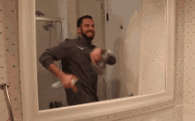 Wiping Mirror Cleaning GIF - Wiping Mirror Cleaning Spray GIFs