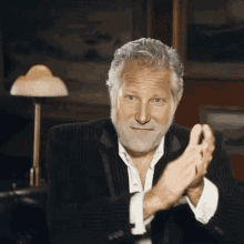 most interesting man clapping
