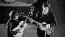 Paul Mc Cartney Playing Guitar GIF - Paul Mc Cartney Playing Guitar The Beatles GIFs