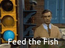 Mister Rogers Feed The Fish GIF - Mister Rogers Feed The Fish Mister Rogers Neighborhood GIFs