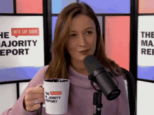emma vigeland majority report coffee mug promotion