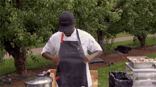Wearing The Apron Top Chef GIF - Wearing The Apron Top Chef Prepping To Cook GIFs