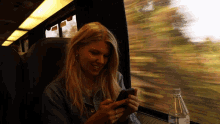 On Phone Brynn Elliott GIF - On Phone Brynn Elliott In The Train GIFs