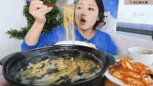 blow hot steamy noodles kimchi