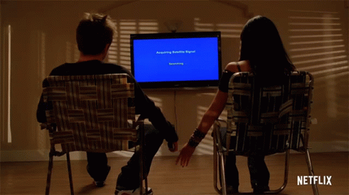holding-hands-watching-tv.gif