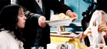 Serving Food To The Table GIF - Serving Server Serving Food GIFs