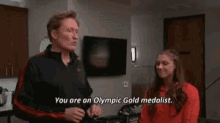 Conan O Brien Olympics GIF - Conan O Brien Olympics Gold Medalist GIFs