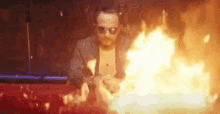 look stare fierce fire man in front of fire