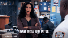 I Want To See Your Tattoo Gina Linetti GIF - I Want To See Your Tattoo Gina Linetti Brooklyn Nine Nine GIFs