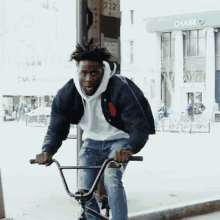 riding my bicycle nigel sylvester i gotta go i need to get there quick xset