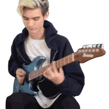 playing guitar tim henson strumming feeling the music performing playing guitar tim henson strumming feeling the music performing