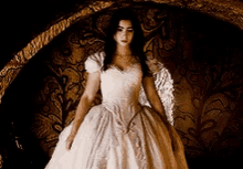 Lily Collins Pose GIF - Lily Collins Pose Mirror Mirror GIFs