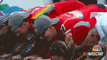 Kissing The Floor Team GIF - Kissing The Floor Team Racer GIFs