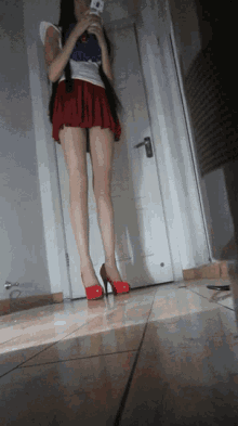 Long Legged Red Shoes GIF - Long Legged Red Shoes Texting GIFs