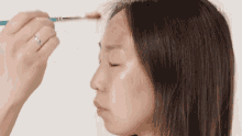 make up artistry foundation brush make up blending elle