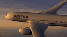 United Airlines Flying GIF - United Airlines Flying Airplane GIFs