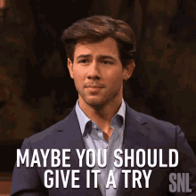 Maybe You Should Give It A Try Nick Jonas GIF - Maybe You Should Give It A Try Nick Jonas Saturday Night Live GIFs